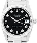 Lady's 26mm Datejust in Steel with White Gold Fluted Bezel on Oyster Bracelet with Black Diamond Dial