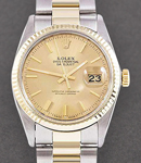 Datejust 36mm in Steel with Yellow Gold Fluted Bezel  on Oyster Bracelet with Champagne Stick Dial