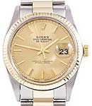 Datejust 36mm in Steel with Yellow Gold Fluted Bezel  on Oyster Bracelet with Champagne Stick Dial