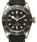 Heritage Black Bay in Steel with Yellow Gold Bezel on Brown Aged Fabric Leather Strap with Black Dial