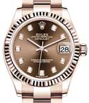 Datejust 31mm Mid Size in Rose Gold with Fluted Bezel on Oyster Bracelet with Chocolate Diamond Dial