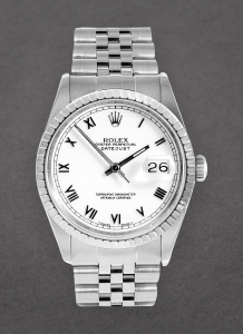 Pre-Owned Rolex 16220 Datejust 36mm in Steel with Engine Turned Bezel 16220