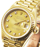 President in Yellow Gold with Fluted Bezel on President Bracelet with Champagne Diamond Dial