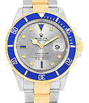 Submariner 40mm in Steel with Blue Bezel on Oyster Bracelet With Silver Serti Diamond Dial