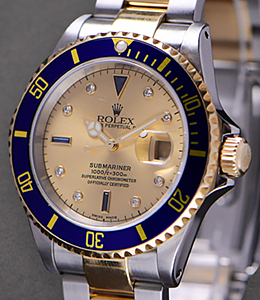 Submariner 2-Tone with Champagne Serti Dial Case has Holes - Bracelet has gold through Buckle