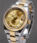 Sky Dweller 42mm in Steel with Yellow Gold Fluted Bezel on Oyster Bracelet with Champagne Stick Dial