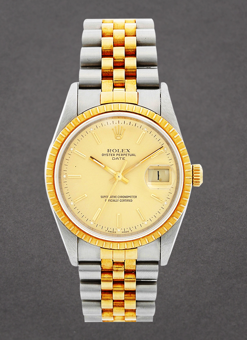 Pre-Owned Rolex Date 34mm in Steel with Yellow Gold Fluted Bezel