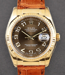 Datejust 36mm in Yellow Gold with Fluted Bezel on Strap with Brown Arabic Dial