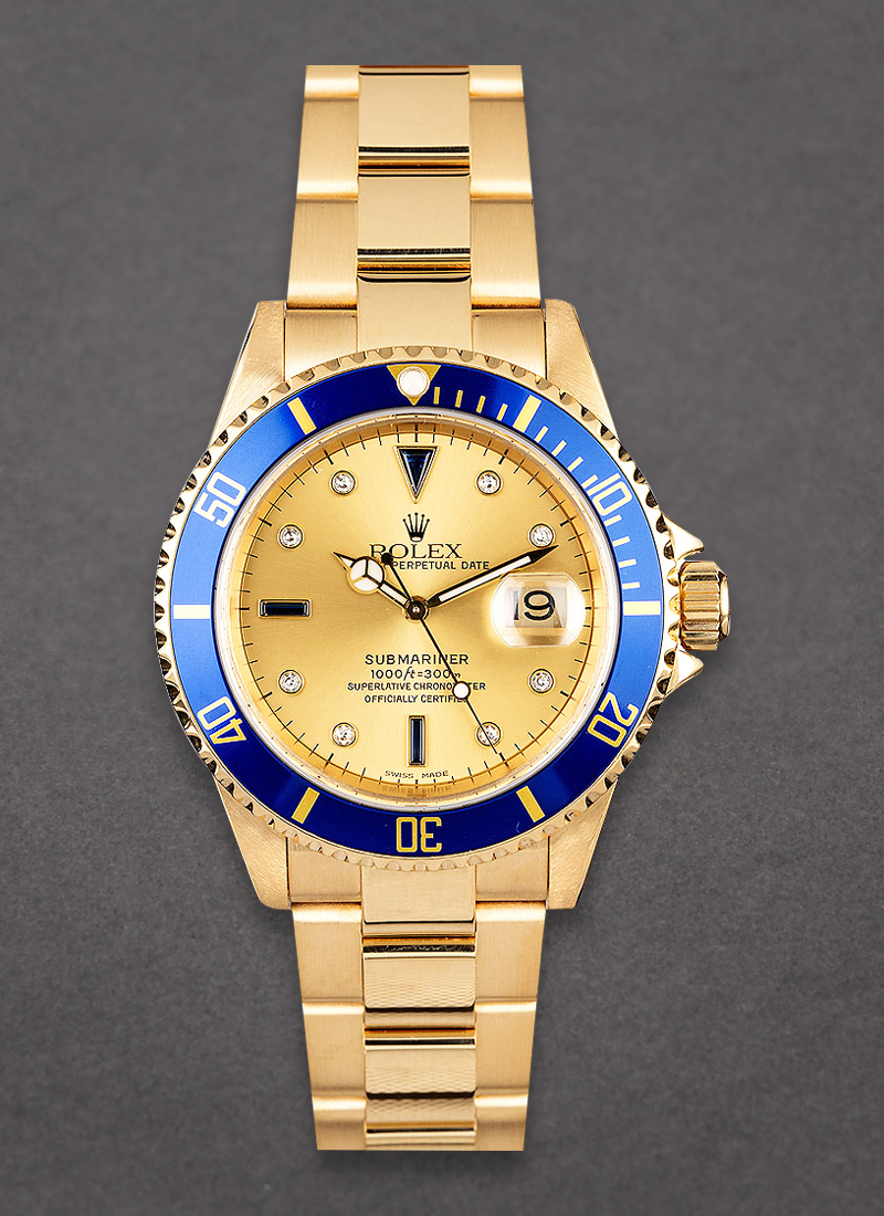 Pre-Owned Rolex Submariner 40mm in Yellow Gold with Blue Ceramic Bezel