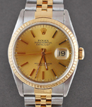 Datejust 36mm in Steel with Yellow Gold Fluted Bezel on Jubilee Bracelet with Champagne Stick Dial