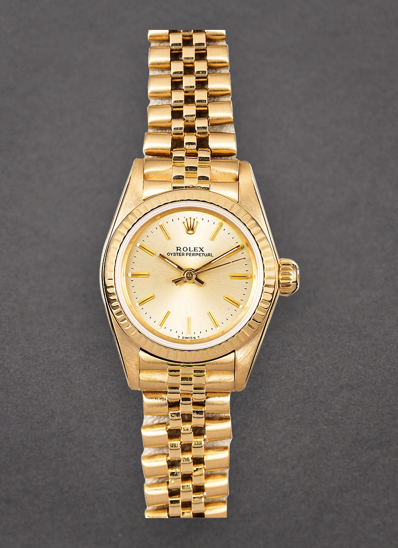 Pre-Owned Rolex Oyster Perpetual No Date Lady's in Yellow Gold with Fluted Bezel