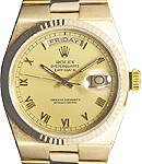 Day-Date President 36mm in Yellow Gold with Fluted Bezel  on Oyster Quartz Bracelet with Champagne Roman Dial
