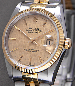 Datejust 36mm in Steel with Yellow Gold Fluted Bezel on Jubilee Bracelet with Champagne Linen Stick Dial