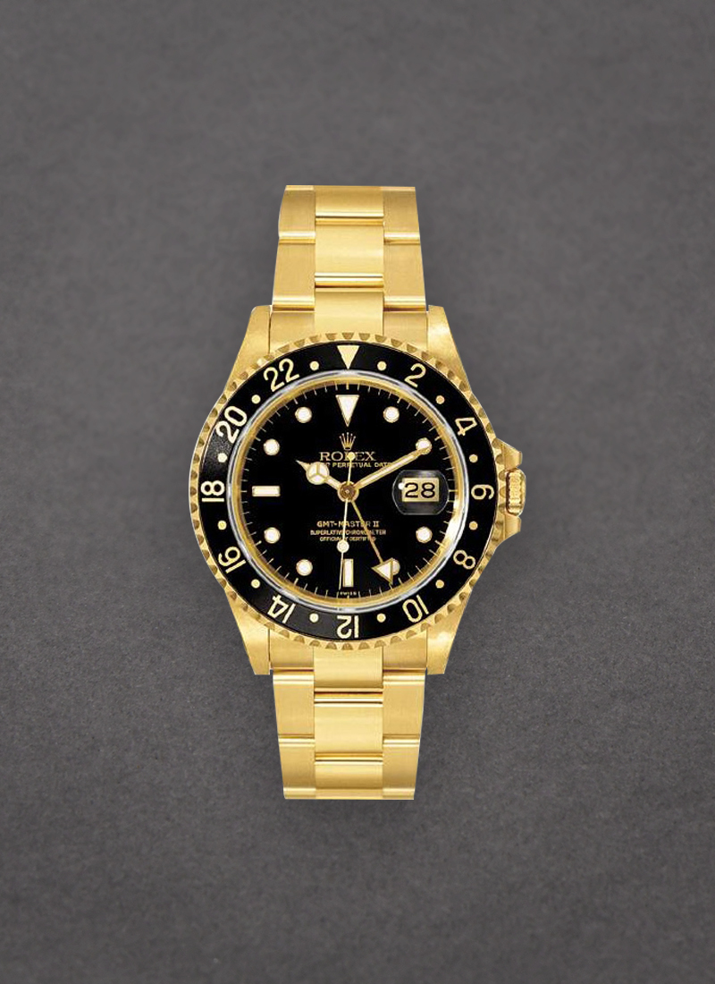 Pre-Owned Rolex GMT Master II in Yellow Gold Ref 16718 with Black Bezel