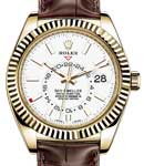 Sky Dweller 42mm in Yellow Gold with Fluted Bezel on Strap with White Index Dial