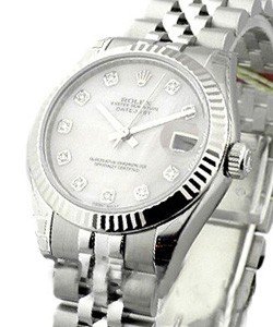 Mid Size 31mm Datejust in Steel with Fluted Bezel on Jubilee Bracelet with White MOP Diamond Dial