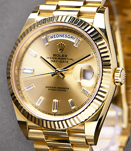 Day Date 40mm in Yellow Gold with Fluted Bezel on President Bracelet with Champagne Diamond Dial