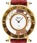 Happy Diamondsin Yellow Gold with Floating Diamonds on Red Leather Strap with White Dial