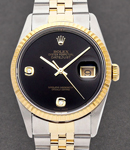 Datejust 36mm in Steel with Yellow Gold Fluted Bezel on Jubilee Bracelet with Black Onyx Dial