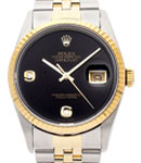Datejust 36mm in Steel with Yellow Gold Fluted Bezel on Jubilee Bracelet with Black Onyx Dial