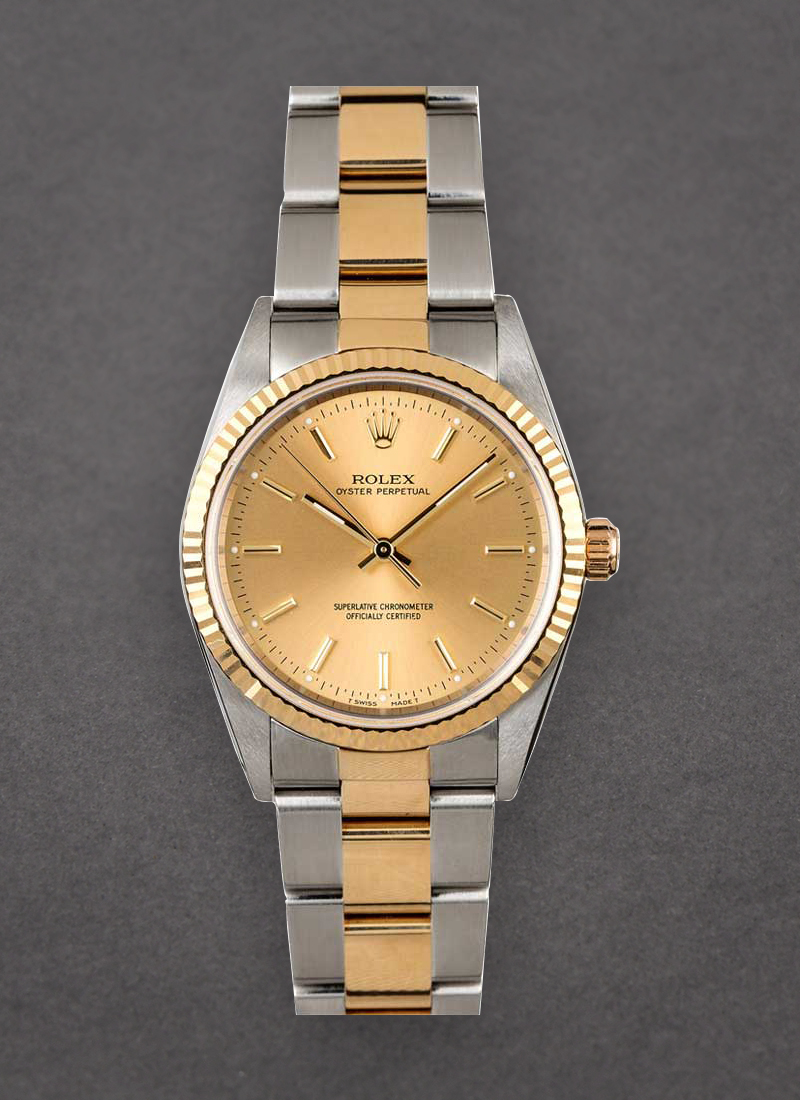 Pre-Owned Rolex Oyster Perpetual No Date 34mm in Steel with Yellow Gold Fluted Bezel