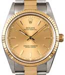 Oyster Perpetual No Date 34mm in Steel with Yellow Gold Fluted Bezel on Oyster Bracelet with Champagne Stick Dial