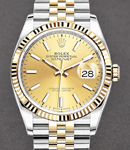 Datejust 36mm in Steel with Yellow Gold Fluted Bezel on Jubilee Bracelet with Champagne Stick Dial