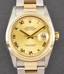 Datejust 36mm in Steel with Yellow Gold Smooth Bezel on Oyster Bracelet with Champagne Roman Dial