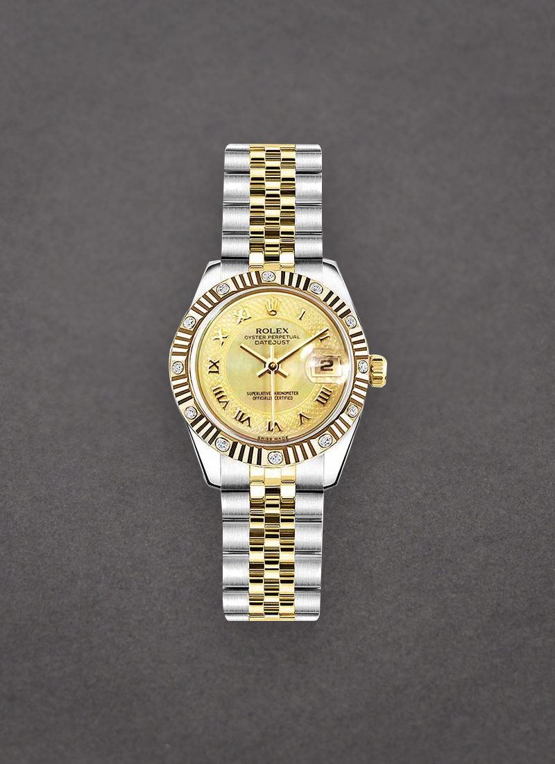 Pre-Owned Rolex Lady's 26mm Datejust in Steel with Yellow Gold Fluted Diamond Bezel