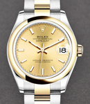 Datejust 31mm in Steel with Yellow Gold Domed Bezel on Oyster Bracelet with Champagne Stick Dial
