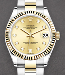 Midsize Datejust 31mm in Steel with Yellow Gold Fluted Bezel on Oyster Braclet with Champagne Diamond Dial