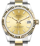 Midsize Datejust 31mm in Steel with Yellow Gold Fluted Bezel on Oyster Braclet with Champagne Index Dial