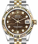 Mid Size Datejust 31mm in Steel with Yellow Gold Fluted Bezel on Jubilee Braclet with Dark MOP Diamond Dial