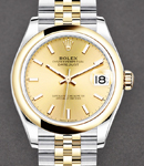 Datejust 31mm in Steel with Yellow Gold Domed Bezel on Jubilee Bracelet with Champagne Stick Dial