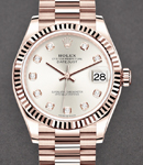 Datejust 31mm Mid Size in Rose Gold with Fluted Bezel on President Bracelet with Silver Diamond Dial