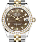 Mid Size 31mm Datejust in Steel with Yellow Gold Diamond Bezel on Jubilee Bracelet with Black MOP Diamond Dial
