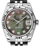 Datejust 31mm in Steel with White Gold Fluted Bezel on Jubilee Bracelet with Black MOP Diamond Dial