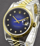 Datejust 36mm in Steel with Yellow Gold Fluted Bezel on Jubilee Bracelet with Blue Vignette Diamond Dial