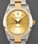 Oyster Perpetual 34mm No Date in Steel with Yellow Gold Smooth Bezel on Oyster Bracelet with Champagne Stick Dial