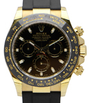 Daytona 40mm Cosmograph in Yellow Gold with Black Bezel on Strap with Black Dial