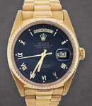 Day-Date President 36mm in Yellow Gold with Fluted Bezel on President Bracelet with Black Roman Dial