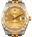 Datejust Mid Size 31mm in Steel with Yellow Gold Fluted Diamond Bezel on Jubilee Bracelet with Champagne Diamond Dial