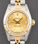 Oyster Perpetual No Date 26mm in Steel with Yellow Gold Fluted Bezel on Jubilee Bracelet with Champagne Diamond Dial