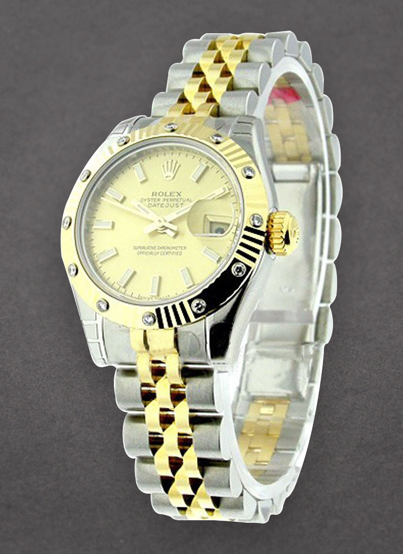 Pre-Owned Rolex Datejust Lady's in Steel with Yellow Gold Fluted 12 Diamond Bezel