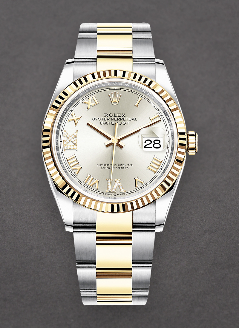 Pre-Owned Rolex 36mm Datejust in Steel with Yellow Gold Fluted Bezel