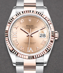 Datejust 36mm in Steel with Rose Gold Fluted Bezel on Oyster Bracelet with Rose Roman Dial with Diamond VI & IX