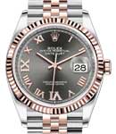 Datejust 36mm in Steel with Rose Gold Fluted Bezel on Jubilee Bracelet with Dark Rhodium Roman Dial with Diamonds on 6 & 9